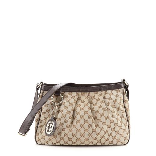 Logomania: Gucci GG Canvas Gucci GG Canvas