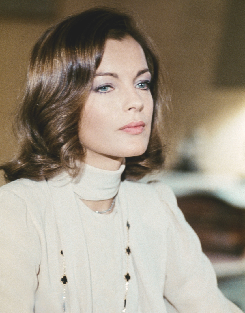 French actress Romy Schneider wearing a Van Cleef & Arpels Alhambra necklace in the 1974 comedy Love at the Top. French actress Romy Schneider wearing a Van Cleef & Arpels Alhambra necklace in the 1974 comedy Love at the Top.