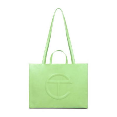 The Telfar Shopping Bag in lime The Telfar Shopping Bag in lime